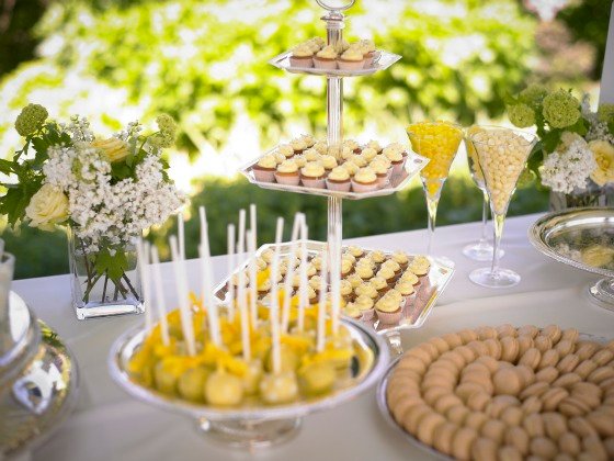 Variety of yellow and citron colours sweets, cookies and cake pops